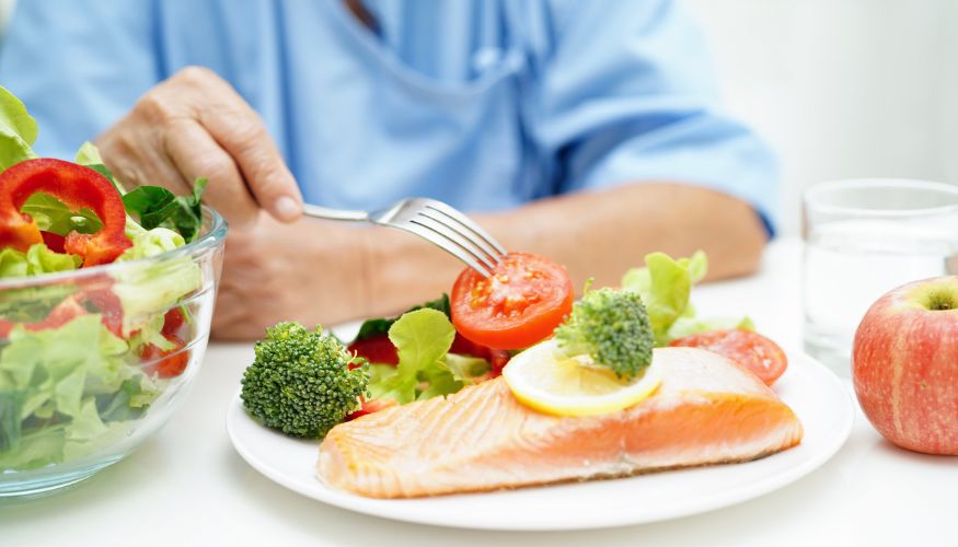 healthy salmon meal being eaten